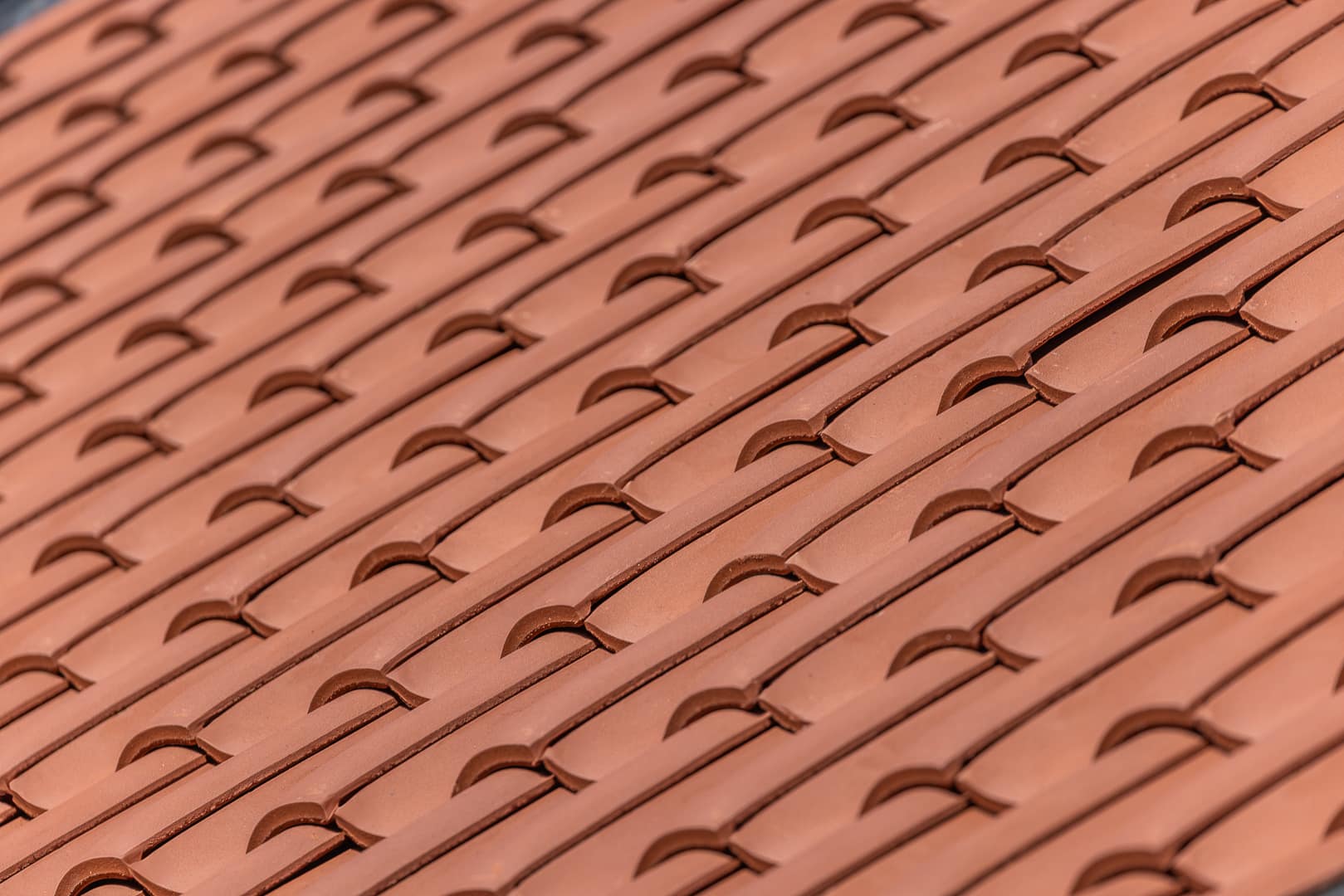 Close-up of the New Lincoln clay interlocking pantiles installed on a roof 
